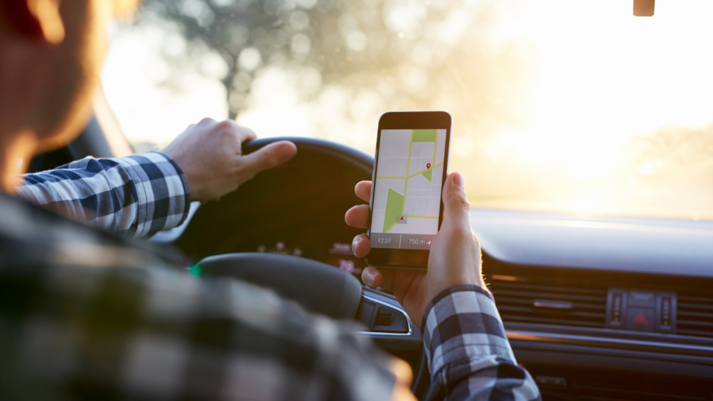 person on their phone whilst driving