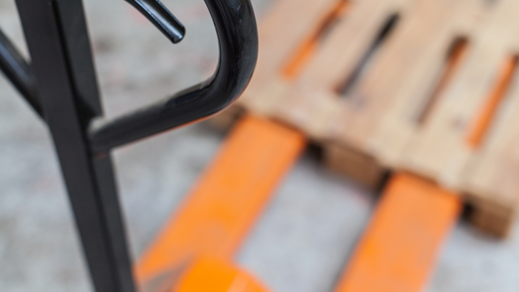 image showing a pump truck inside of a pallet, equipment for a same day courier