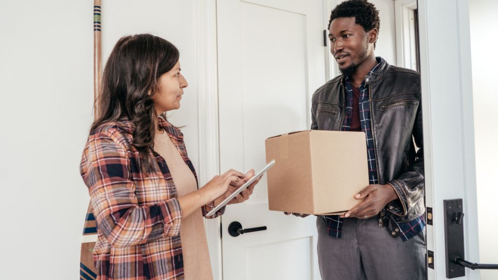 A courier speaking to his manager from a same day courier network 