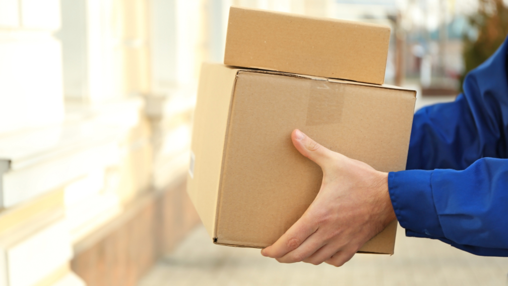 a same day courier carrying boxes